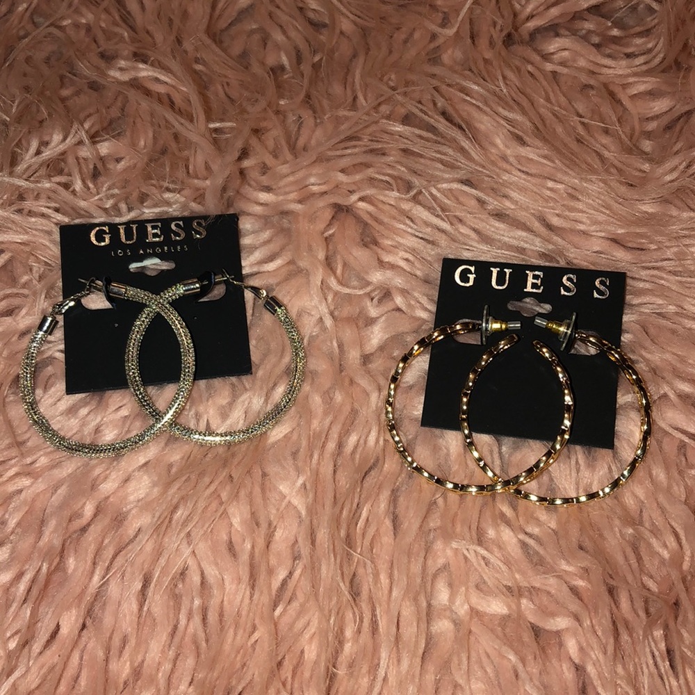 Gold and silver tone guess earrings